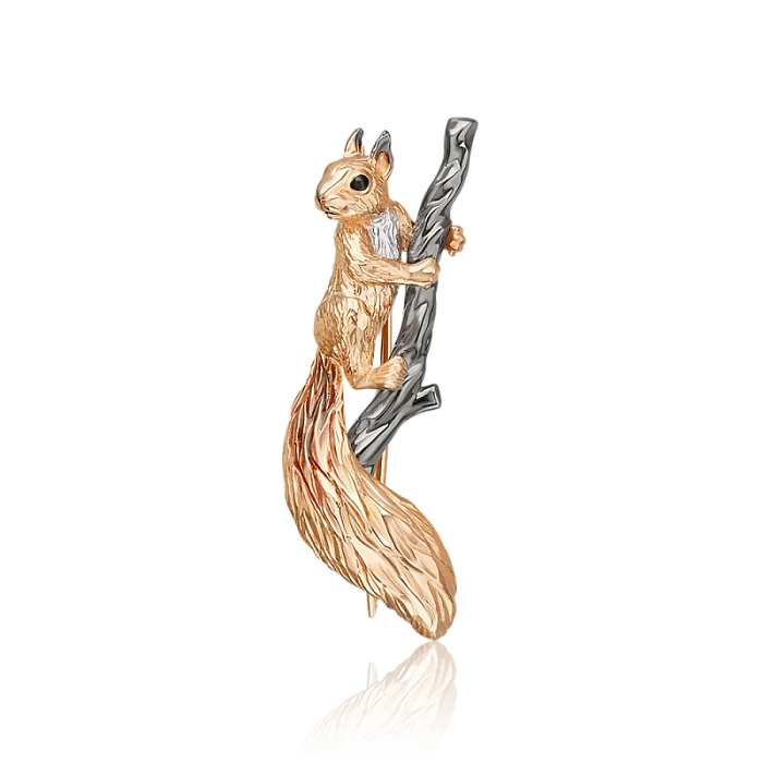 Брошь из комбинированного золота