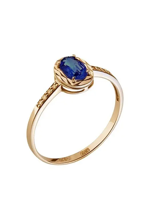 Кольцо декоративное из красного золота с изумрудами