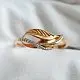 Кольцо декоративное из комбинированного золота