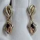 Серьги подвесные из комбинированного золота